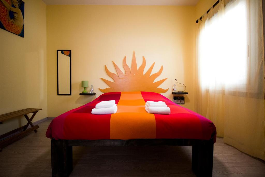 Postel nebo postele na pokoji v ubytování B&B San Leone