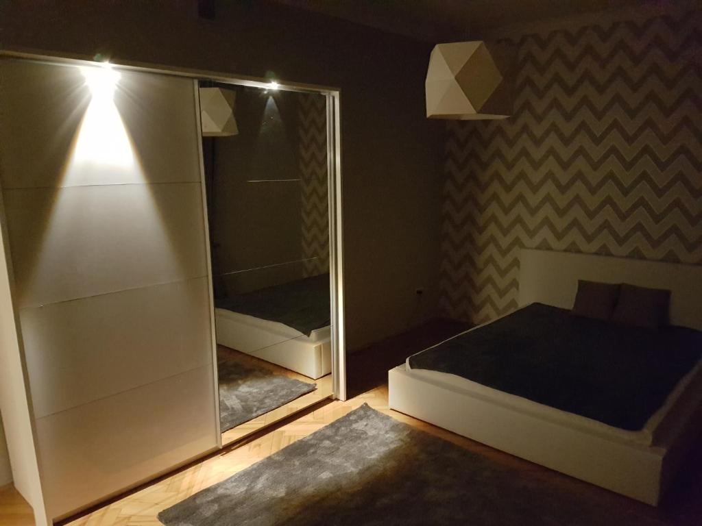 Posteľ alebo postele v izbe v ubytovaní Rzeszów Apartment