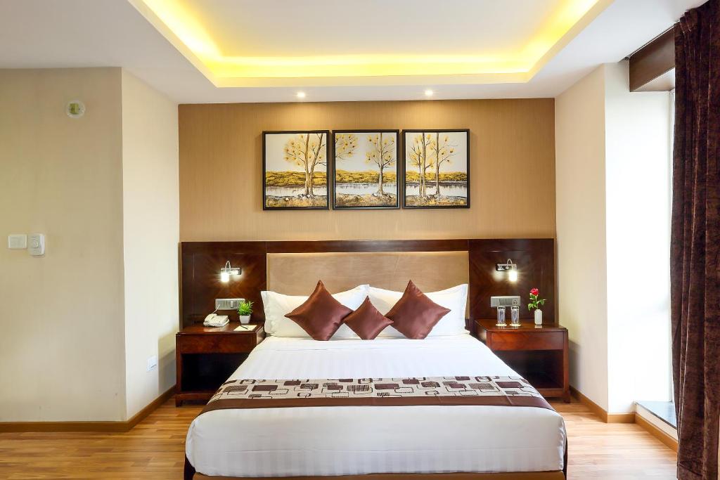 Postel nebo postele na pokoji v ubytování Delta Suites - The Soothing Luxury