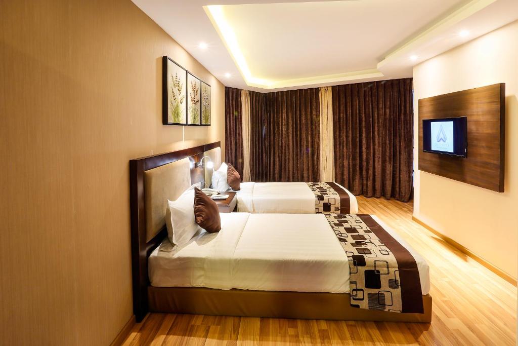 Postel nebo postele na pokoji v ubytování Delta Suites - The Soothing Luxury