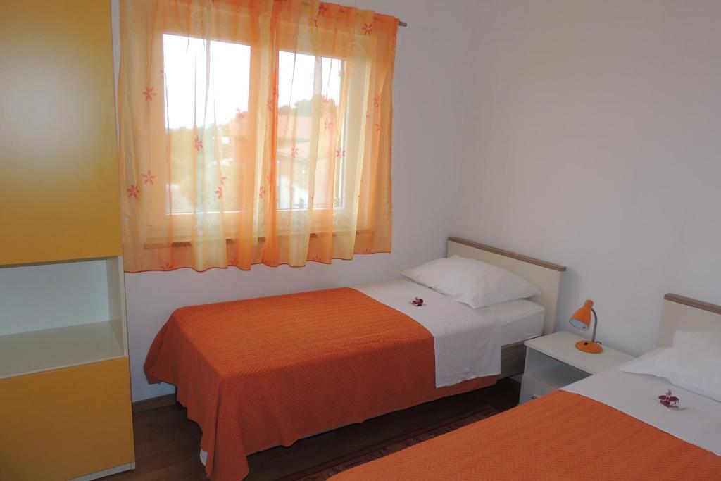 Posteľ alebo postele v izbe v ubytovaní Villa Pineta