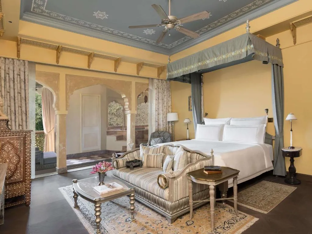 Landmark Room, King Bed, Plunge Pool and Balcony:Enjoy 20% savings on F&B, Spa and Laundry along with one Jaipur Sling Experience. Unwind with a spacious bathroom, balcony daybed and private outdoor bath overlooking the Aravalli Hills.