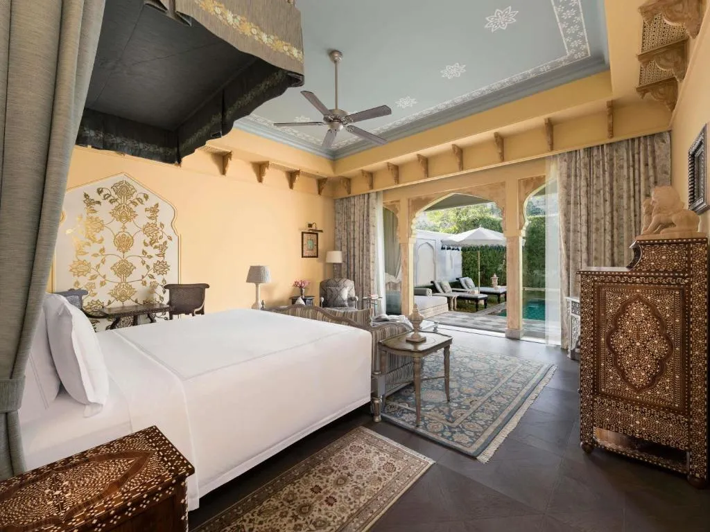 Princess Suite, King Bed with Private Pool:Enjoy 20% savings on F&B, Spa & Laundry, one-way airport transfer, one Jaipur Sling & Mineral Pool Experience, 01 bottle of wine, Afternoon Tea Experience. Private temperature-controlled pool with craftsmanship