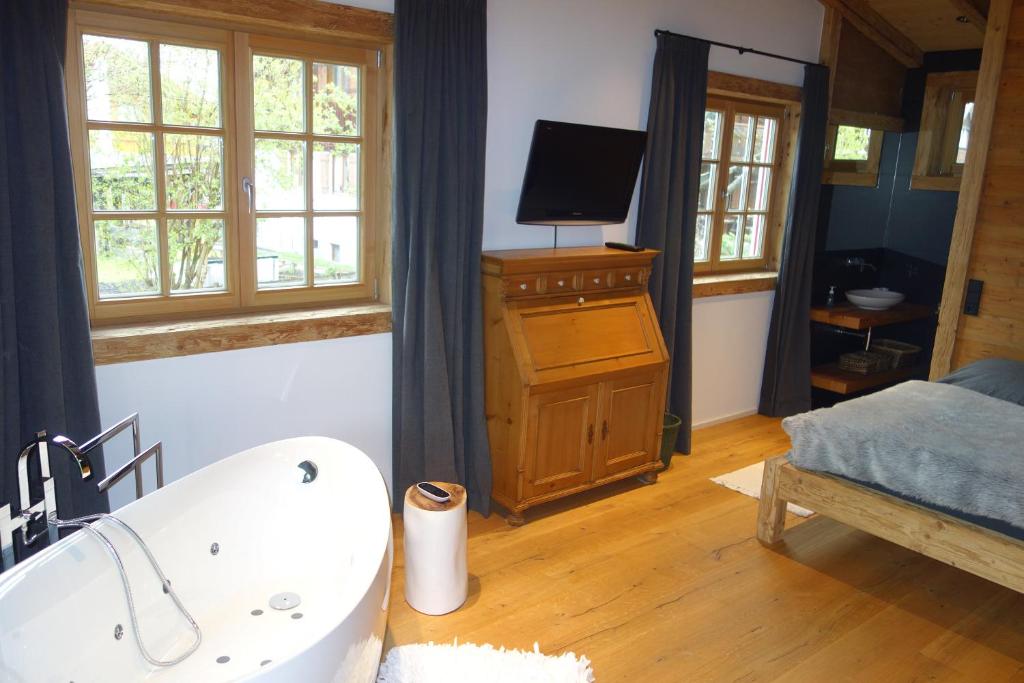 Postel nebo postele na pokoji v ubytování Haus Iris