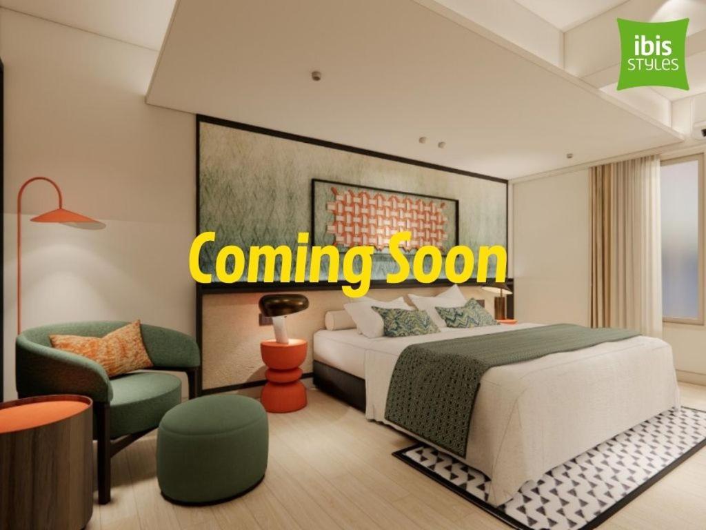 A rendered bedroom variation with green seating and patterned textiles.