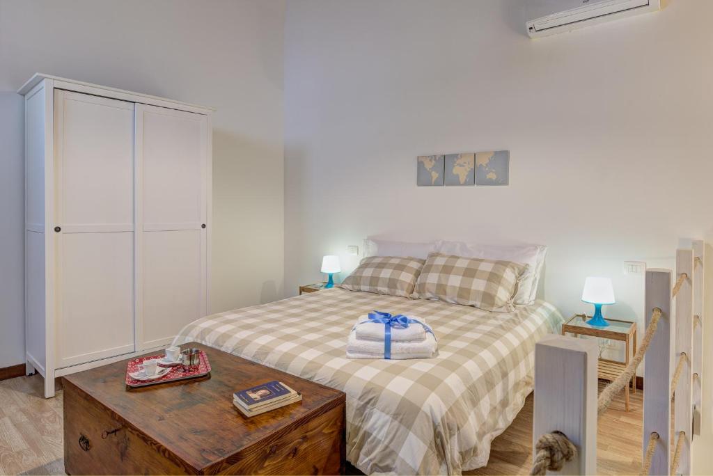 Postel nebo postele na pokoji v ubytování B&B Vico Manenti