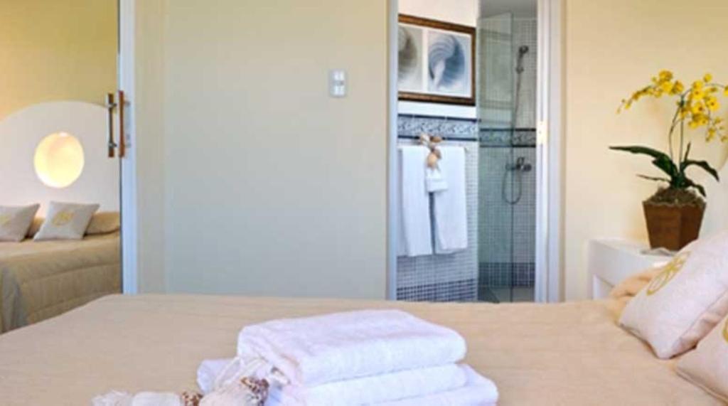 Postel nebo postele na pokoji v ubytování Lifestyle Crown Residence Suites