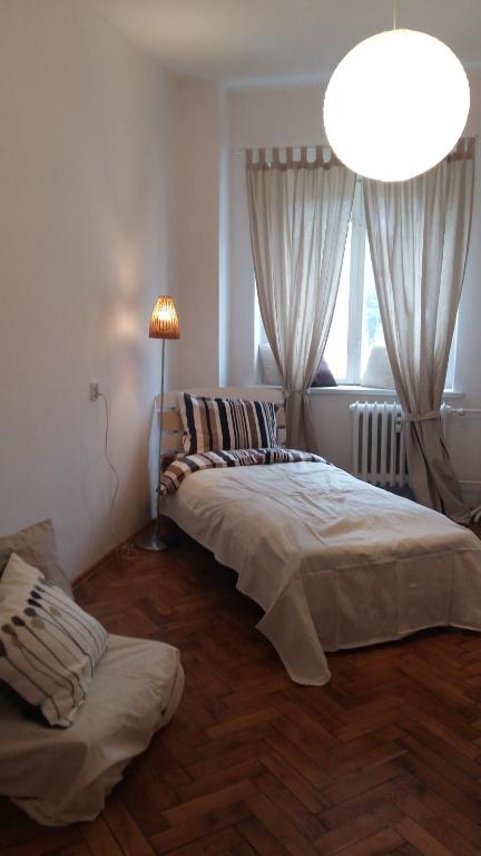 Posteľ alebo postele v izbe v ubytovaní Apartament pod Piernikiem