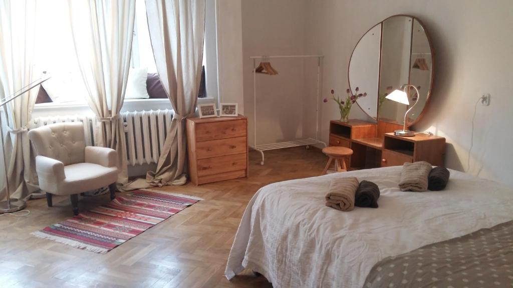 Posteľ alebo postele v izbe v ubytovaní Apartament pod Piernikiem