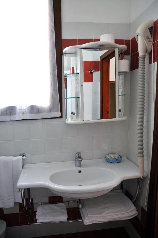 Koupelna v ubytování Hotel Reno