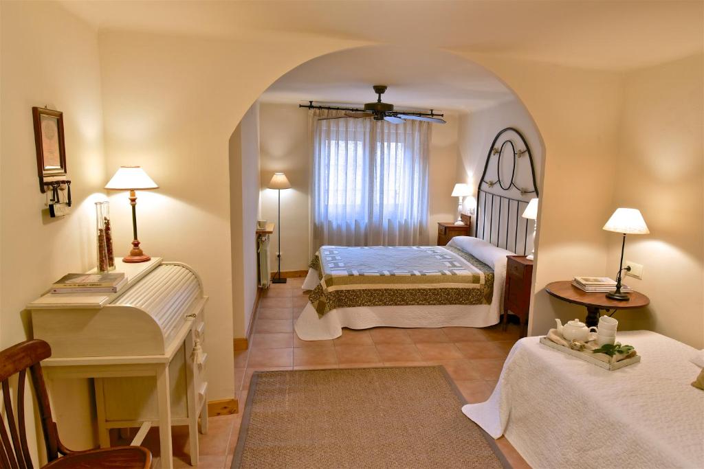 A bed or beds in a room at Cal Barceló