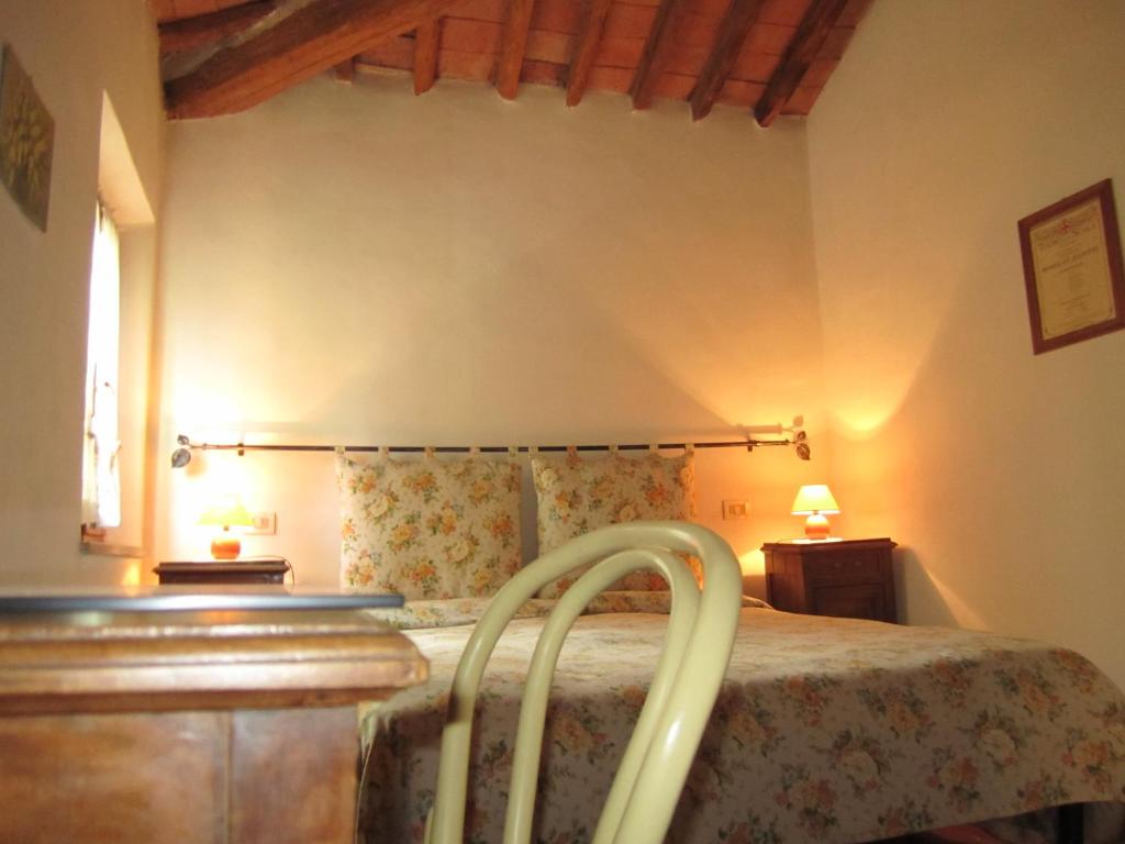A bed or beds in a room at A Casa di Lizzy B&B