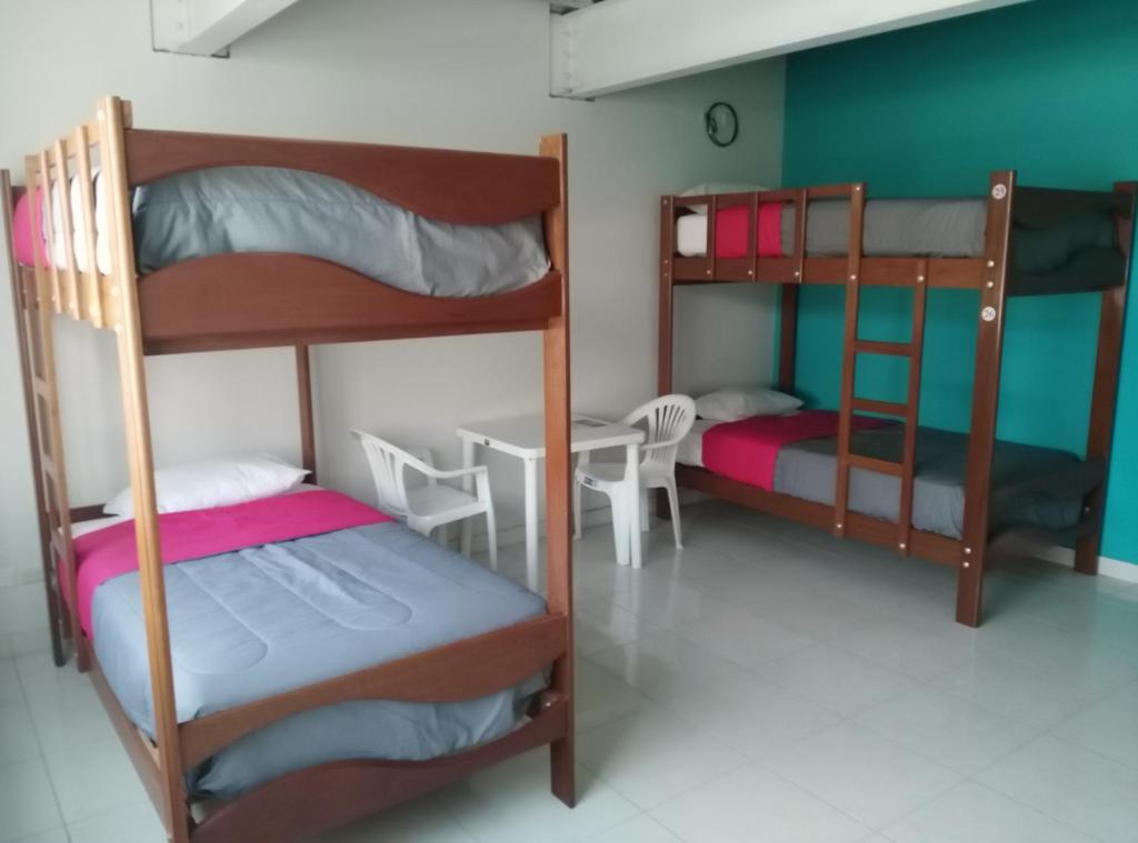 Postel nebo postele na pokoji v ubytování Kelebek Hostel