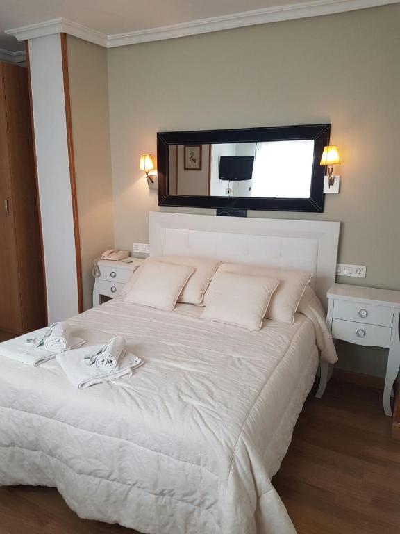 Posteľ alebo postele v izbe v ubytovaní Hotel Principe