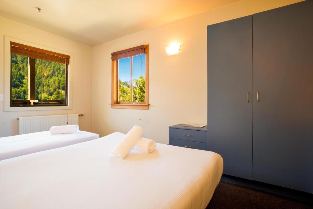 Postel nebo postele na pokoji v ubytování Reavers Lodge
