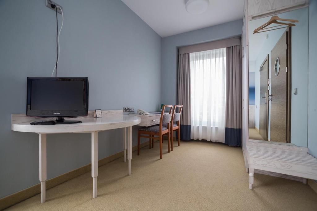 TV a/nebo společenská místnost v ubytování Hotel Morski