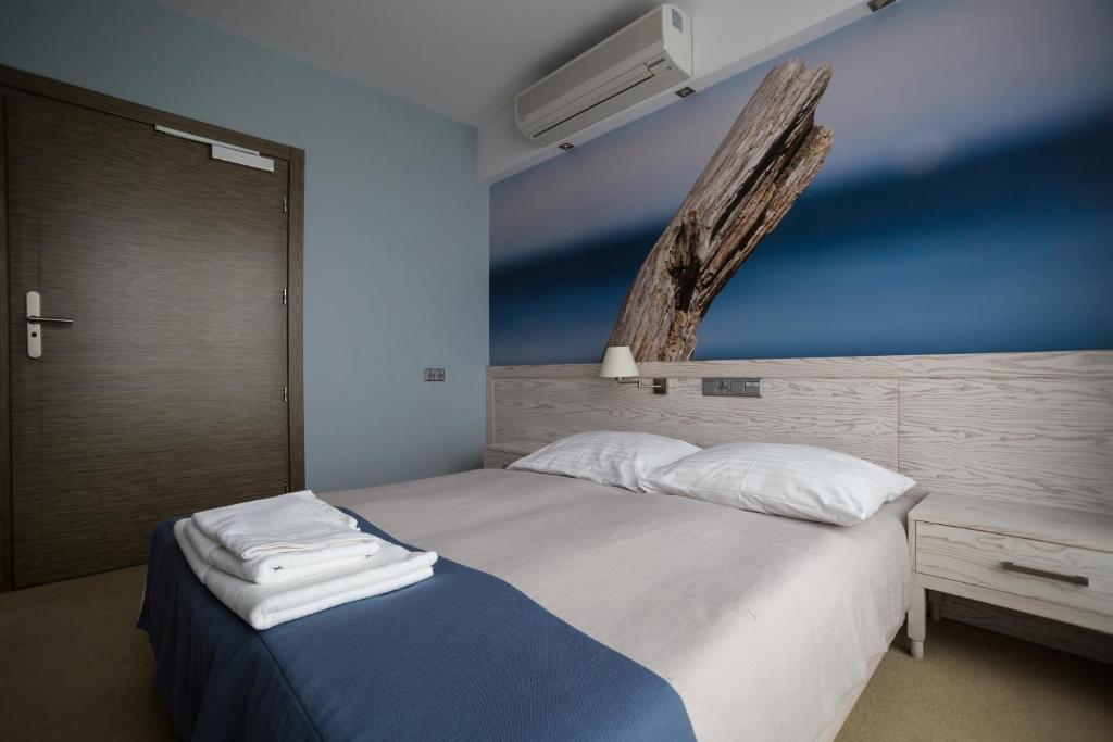 Postel nebo postele na pokoji v ubytování Hotel Morski