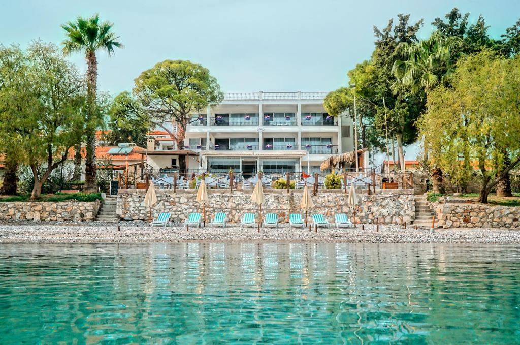 a view of a hotel from the water at Fuda Hotel in Datca