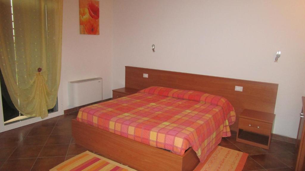 Postel nebo postele na pokoji v ubytování Al Castello