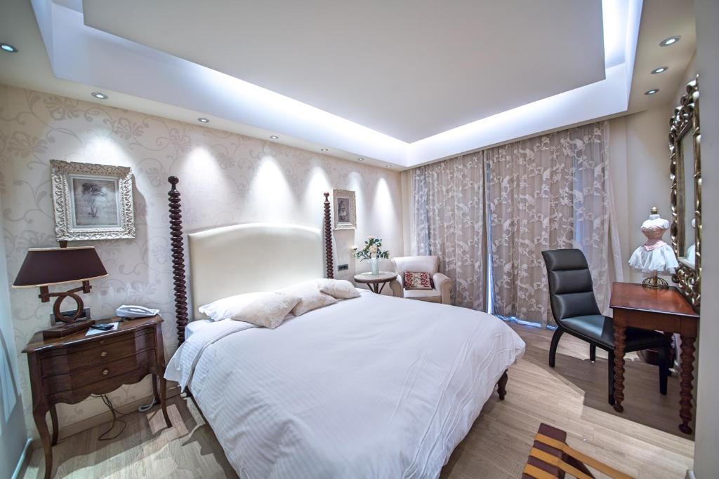 Posteľ alebo postele v izbe v ubytovaní Comfy Boutique Hotel