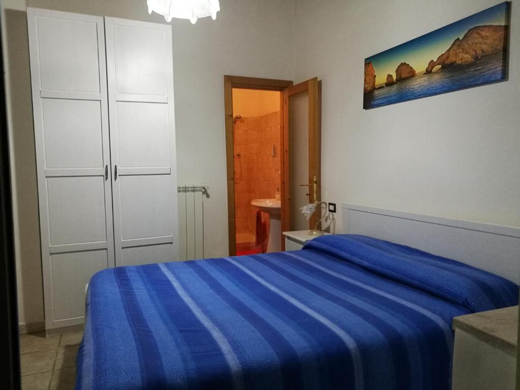 Postel nebo postele na pokoji v ubytování Aloha House
