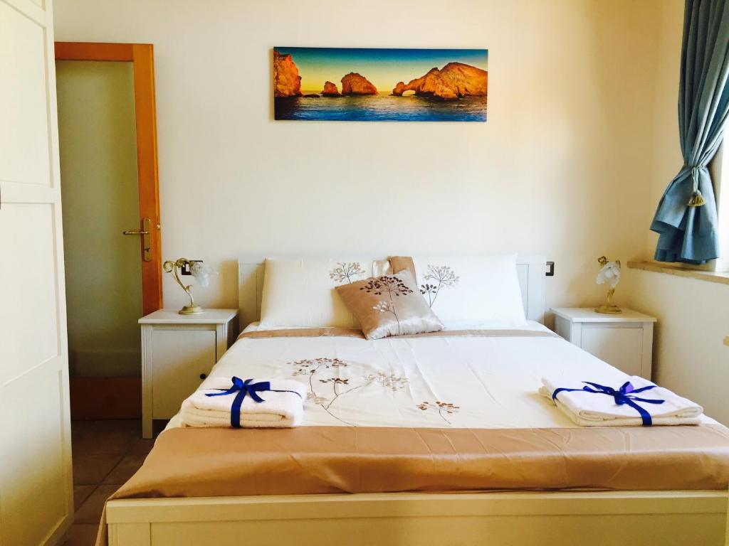 Postel nebo postele na pokoji v ubytování Aloha House