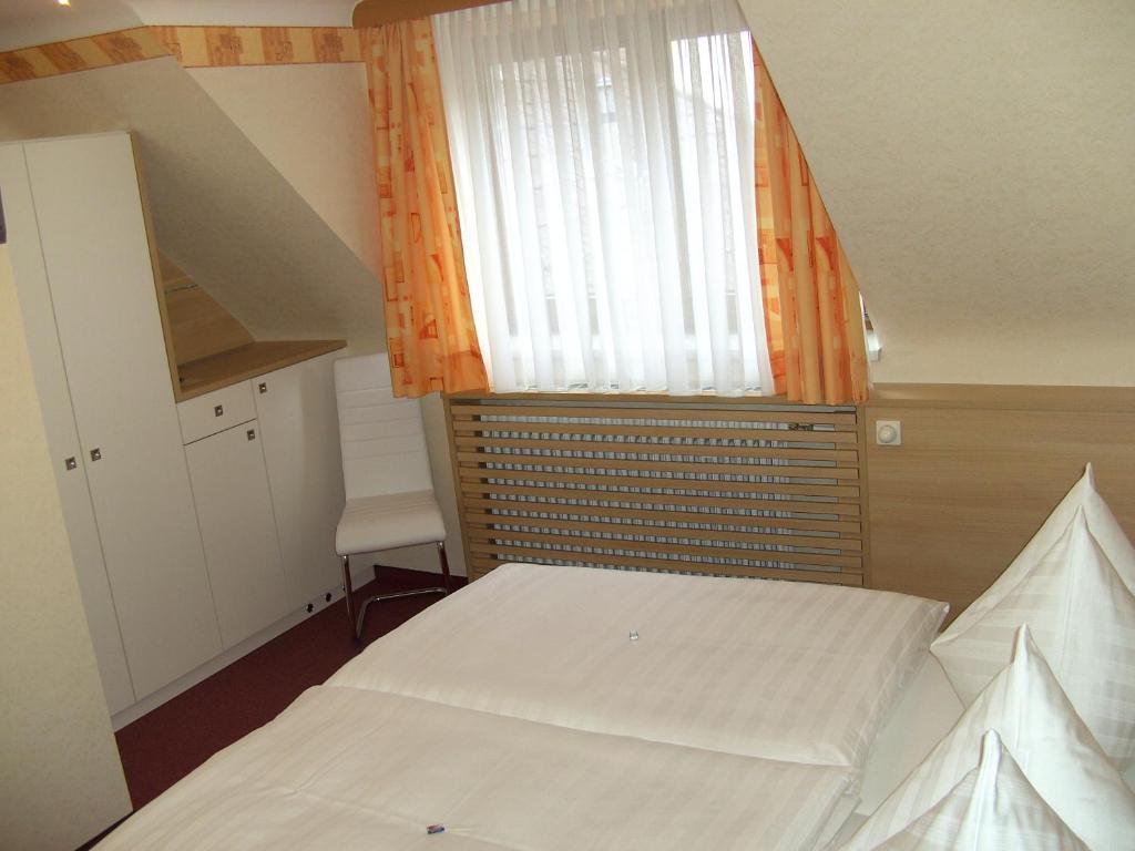 Postel nebo postele na pokoji v ubytování Frühstückspension Leopold Janu