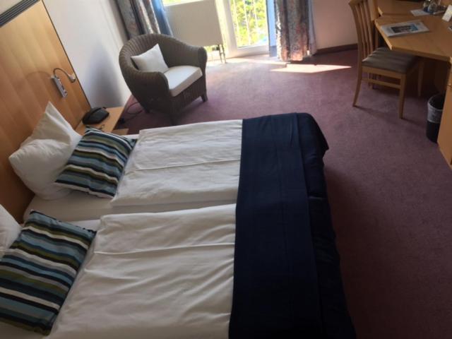 Postel nebo postele na pokoji v ubytování Hotel Torgauer Brauhof