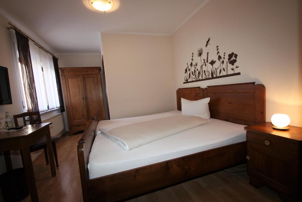 Postel nebo postele na pokoji v ubytování Gasthaus Pension Geimer