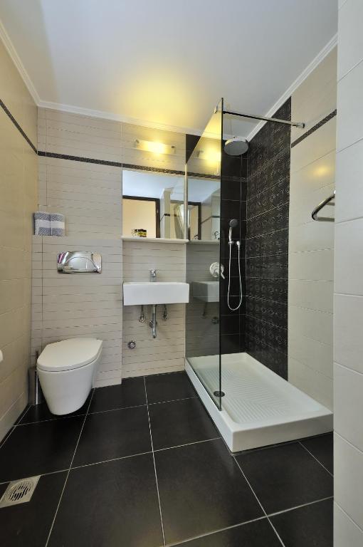 Kúpeľňa v ubytovaní Dryades & Orion Hotel