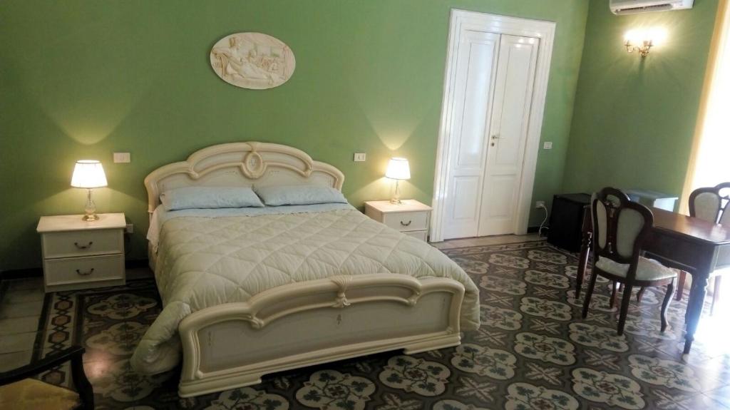 Giường trong phòng chung tại La Dimora