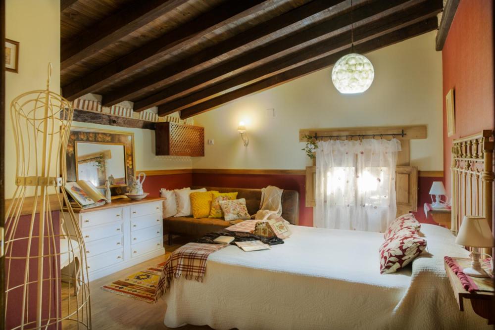 Posteľ alebo postele v izbe v ubytovaní Casa Rural la Casa del Bosque