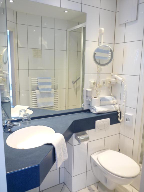 Koupelna v ubytování Mirage City Hotel Stuttgart Zentrum