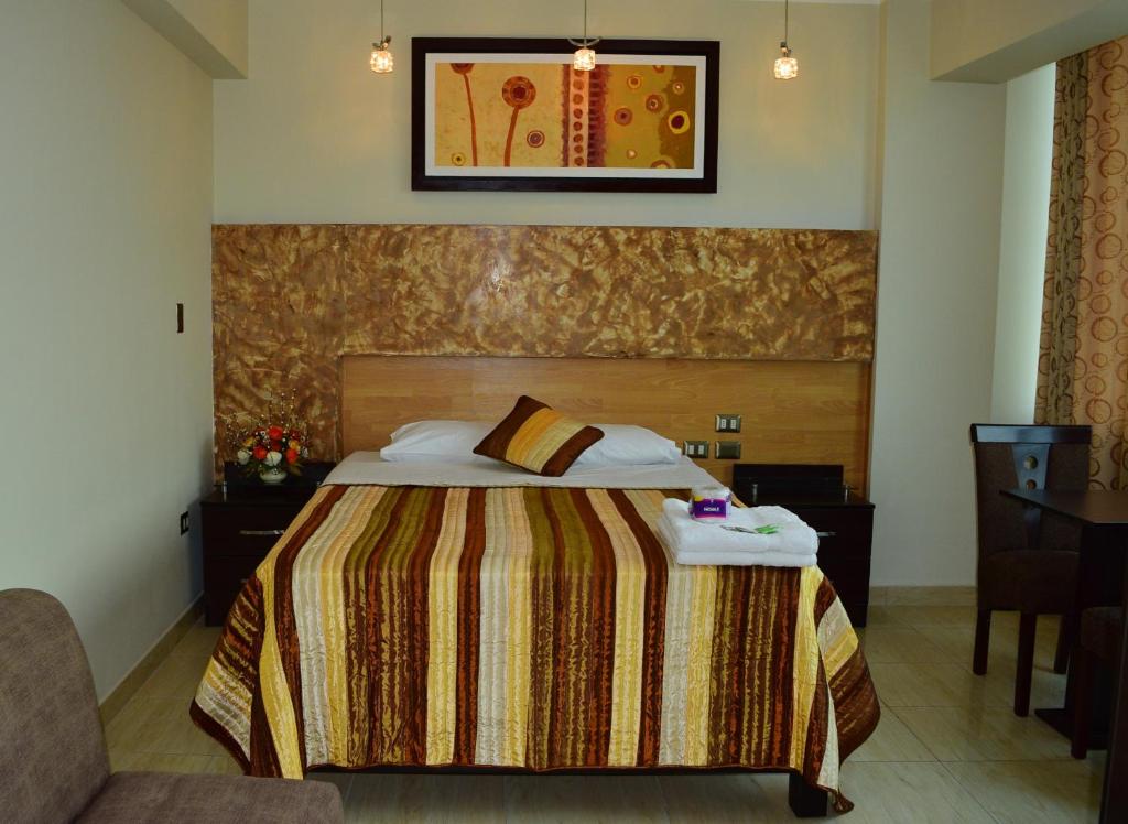 Postel nebo postele na pokoji v ubytování Hostal Gold Star