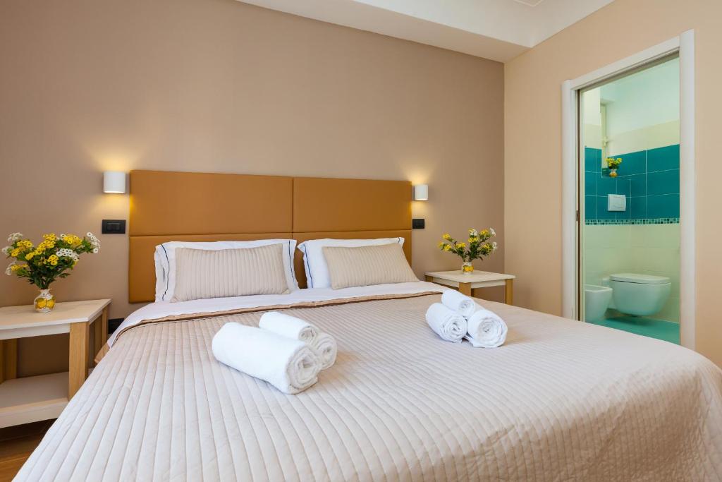 Postel nebo postele na pokoji v ubytování B&B Giacomino