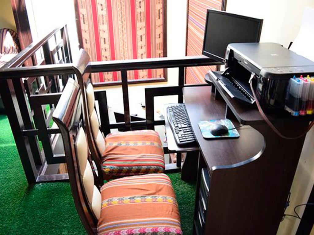 Area soggiorno di Cusco Bed and Breakfast