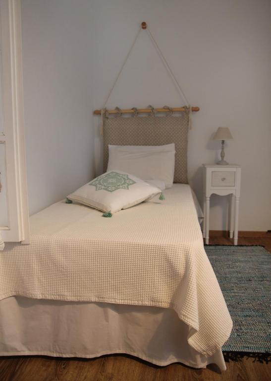 Postel nebo postele na pokoji v ubytování Villa Meli-milon