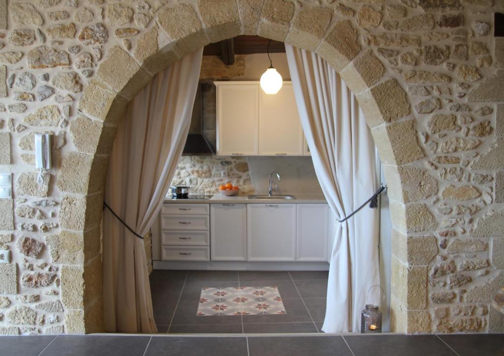 Kuchyň nebo kuchyňský kout v ubytování Villa Meli-milon
