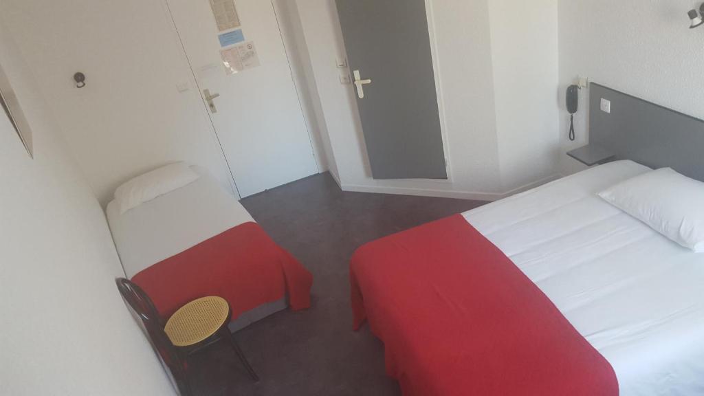 Postel nebo postele na pokoji v ubytování Relax Hotel