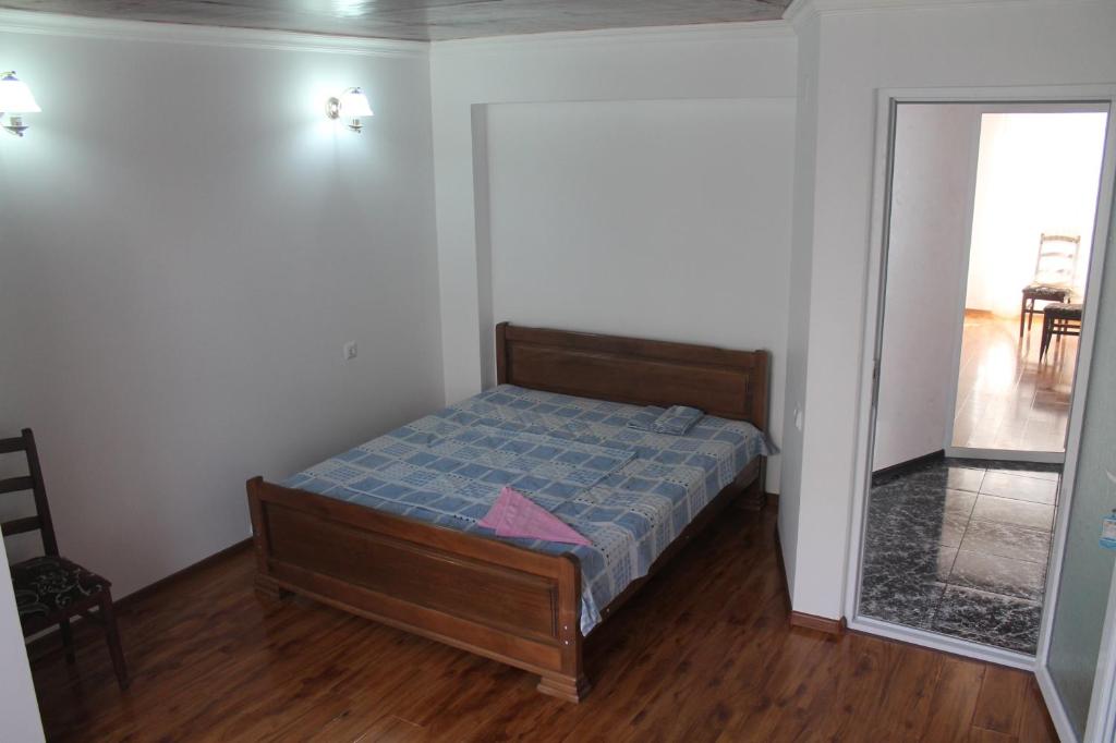 Postel nebo postele na pokoji v ubytování Guest House Maxim