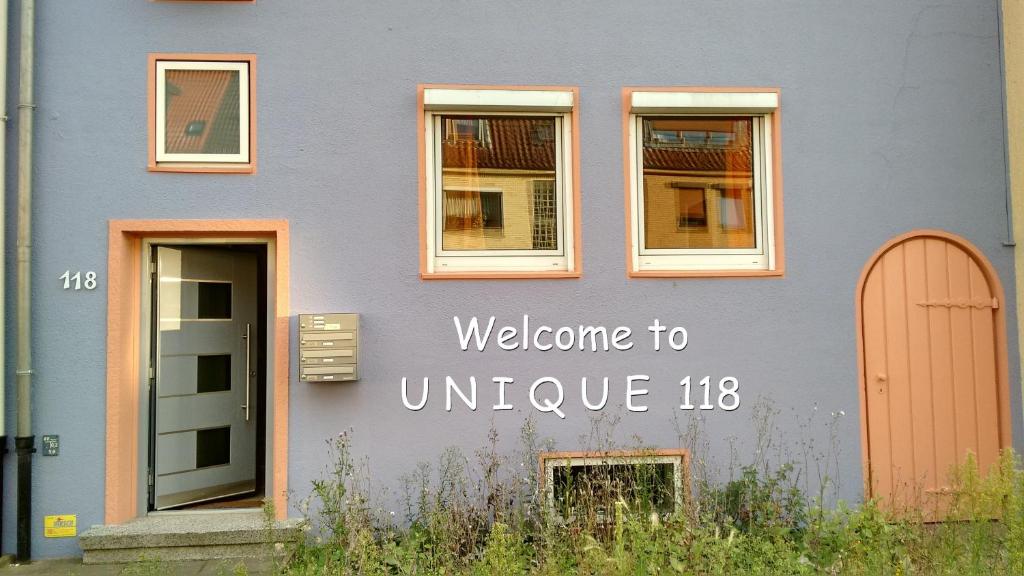 a building with the words welcome touce on it at Unique 118 in Bremen