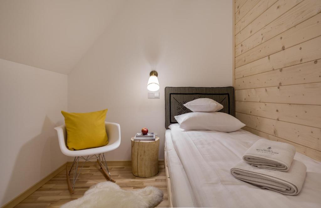 Posteľ alebo postele v izbe v ubytovaní Tatra Wood House