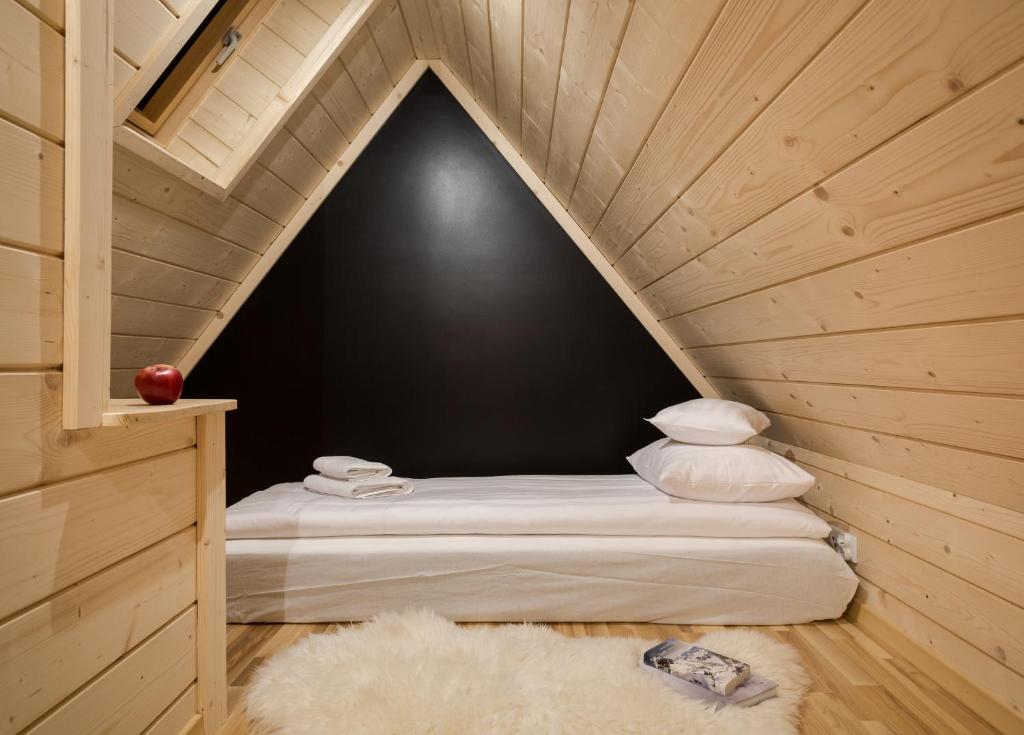 Posteľ alebo postele v izbe v ubytovaní Tatra Wood House