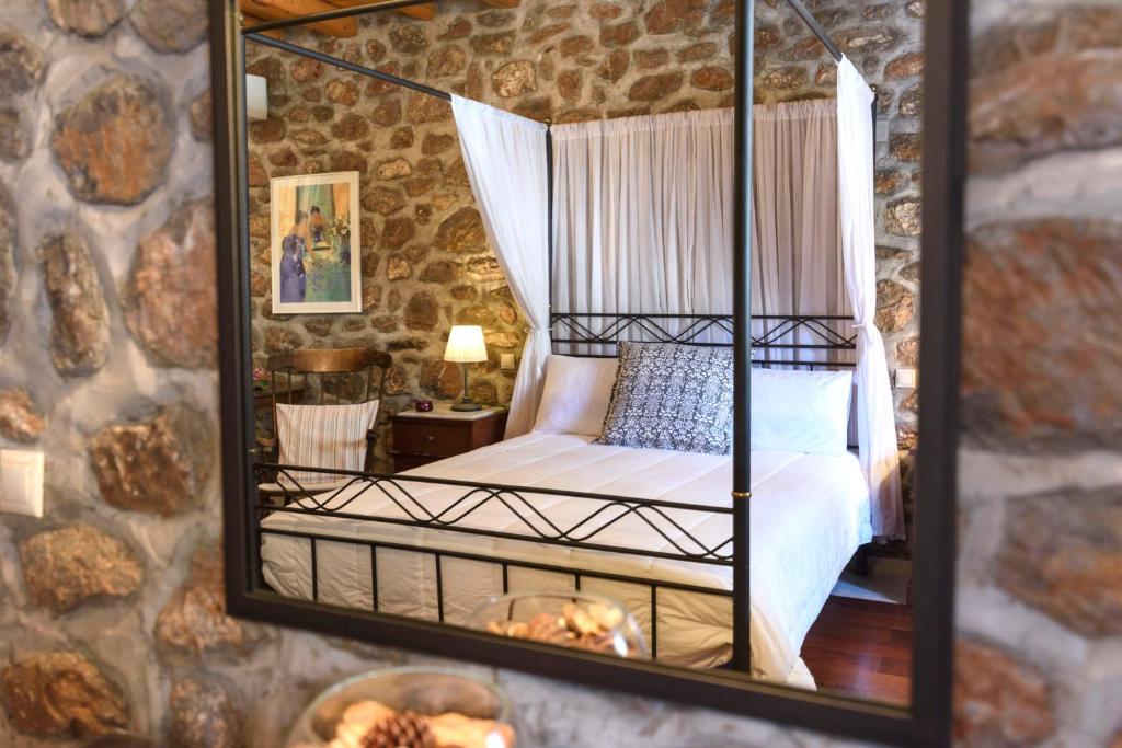 Postel nebo postele na pokoji v ubytování Nereids Guesthouse