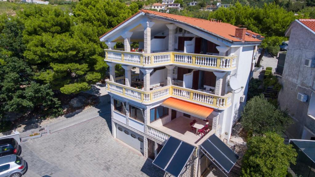 an overhead view of a house with a balcony at Apartments Beach Side Brela in Brela