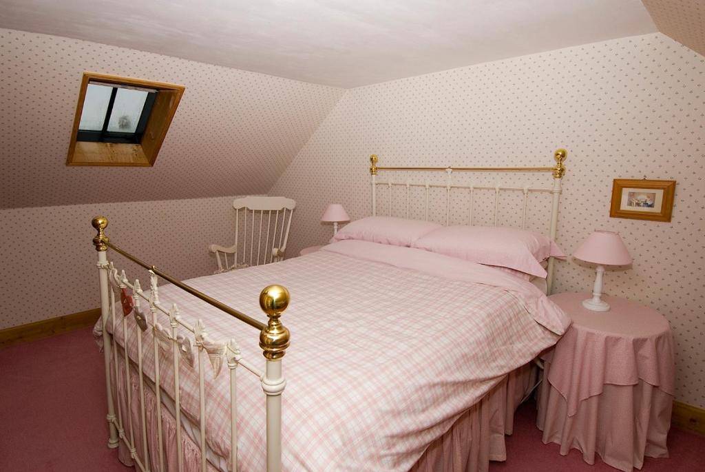 Ein Bett oder Betten in einem Zimmer der Unterkunft Springburn Cottage