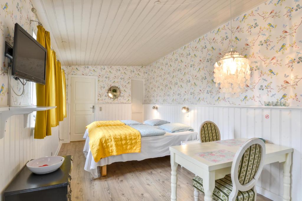 Postel nebo postele na pokoji v ubytování Viborg City Rooms