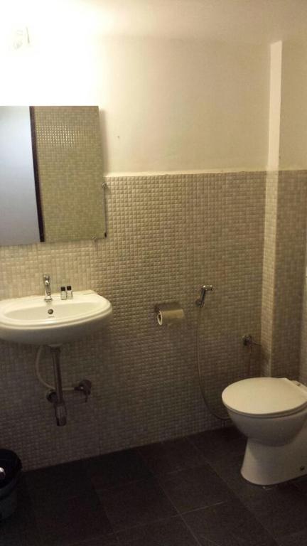 Koupelna v ubytování Hotel Bonanza