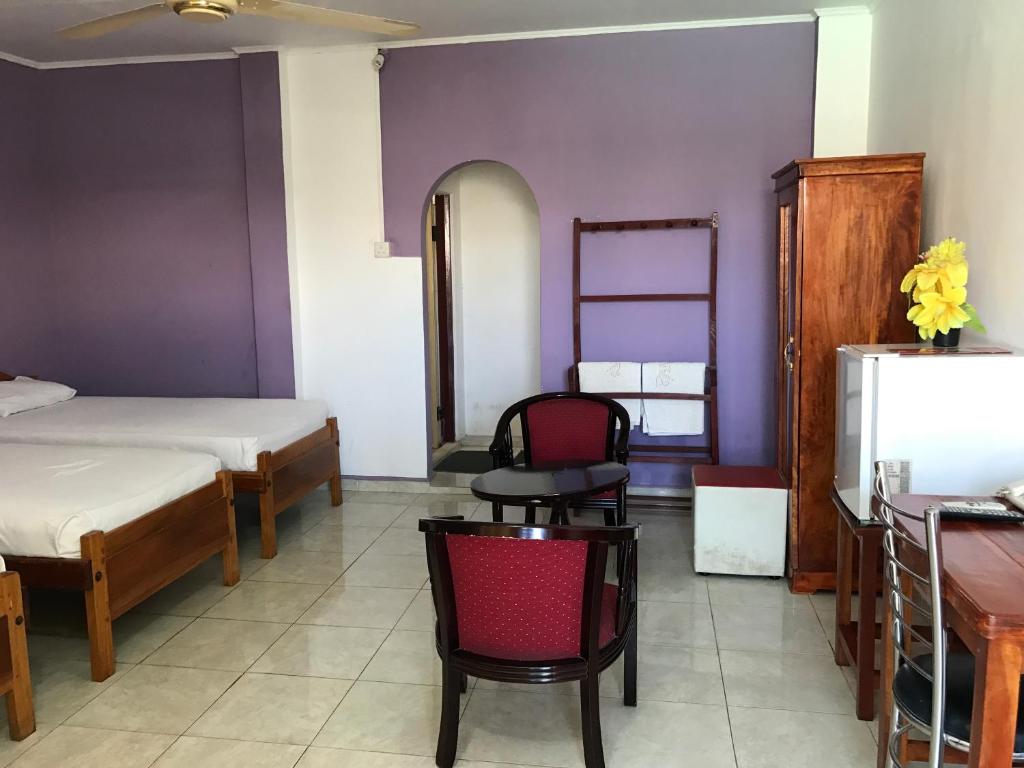 Gnaanams Hotel and Restaurant - Standard Quadruple Room