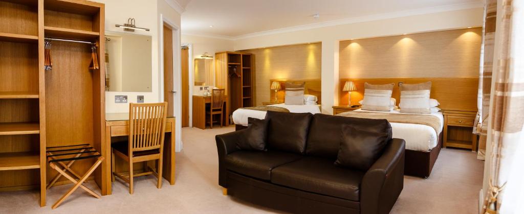 Postel nebo postele na pokoji v ubytování Adamson Hotel